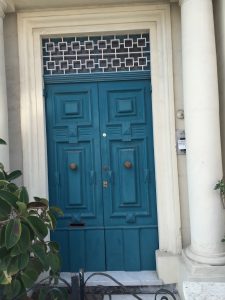 Mediterranean blue security panelled door with traditional door furniture