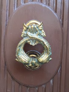 Close up of the fish door knocker
